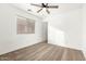 Unfurnished bedroom with ceiling fan, carpeted flooring, and window at 21869 W Mohave St, Buckeye, AZ 85326
