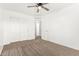 Empty bedroom with closet, carpeting, and ceiling fan at 21869 W Mohave St, Buckeye, AZ 85326