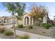 Single story home with a two car garage and landscaped front yard at 22918 E Marsh Rd, Queen Creek, AZ 85142
