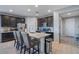 Kitchen boasts granite countertops, stainless steel appliances, and an eat-in island at 22918 E Marsh Rd, Queen Creek, AZ 85142