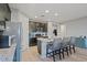 Modern kitchen with granite island, dark cabinetry, and stainless steel appliances at 22918 E Marsh Rd, Queen Creek, AZ 85142