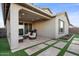 Covered patio with comfortable seating and built-in grill at 22918 E Marsh Rd, Queen Creek, AZ 85142