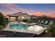 Inviting backyard pool with patio and lounge chairs at 22918 E Marsh Rd, Queen Creek, AZ 85142