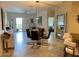 Elegant dining area with glass table and modern chairs at 2511 W Queen Creek Rd # 336, Chandler, AZ 85248