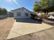 Single story home with driveway and landscaped yard at 3047 E Rosemonte Dr, Phoenix, AZ 85050