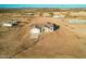 New construction home with tile roof and a two-car garage, aerial view at 35648 W Hidalgo Ave, Tonopah, AZ 85354