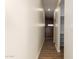 Long hallway with a shower and access to other rooms at 35648 W Hidalgo Ave, Tonopah, AZ 85354