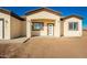 New home with a welcoming front entrance and neutral exterior at 35648 W Hidalgo Ave, Tonopah, AZ 85354