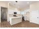 Open concept kitchen with white cabinetry, island, and recessed lighting at 35648 W Hidalgo Ave, Tonopah, AZ 85354