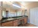 Double vanity bathroom with granite countertop at 42575 W Abbey Rd, Maricopa, AZ 85138