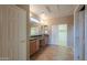 Bathroom with double vanity and walk-in closet at 42575 W Abbey Rd, Maricopa, AZ 85138