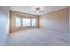 Bright bedroom with bay window and carpet at 42575 W Abbey Rd, Maricopa, AZ 85138