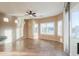 Bright dining room with tile floors and view to backyard at 42575 W Abbey Rd, Maricopa, AZ 85138