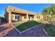 Home exterior showcasing backyard and patio at 42575 W Abbey Rd, Maricopa, AZ 85138