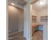 Home office with built-in shelves and desk at 42575 W Abbey Rd, Maricopa, AZ 85138