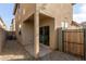 Private backyard patio with gravel landscaping and wooden fence at 5438 W Odeum Ln, Phoenix, AZ 85043