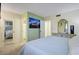 Bright and airy bedroom with mirrored closet doors at 649 S Power Rd # 371, Mesa, AZ 85206