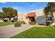 Inviting exterior of a condo building with well-manicured landscaping at 649 S Power Rd # 371, Mesa, AZ 85206