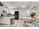Well-equipped kitchen with white cabinets and modern appliances at 649 S Power Rd # 371, Mesa, AZ 85206