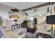 Open living room with a view of the kitchen and access to other rooms at 649 S Power Rd # 371, Mesa, AZ 85206