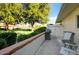 Relaxing patio area, complete with seating and a built-in grill at 649 S Power Rd # 371, Mesa, AZ 85206