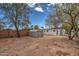 Large backyard with storage shed and wooden fence at 66 W Brooks St, Gilbert, AZ 85233