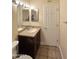 Clean bathroom with vanity, sink, and tiled floors at 7550 N 12Th St # 143, Phoenix, AZ 85020