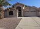 Single-story home with a two-car garage and desert landscaping at 9123 W Sequoia Dr, Peoria, AZ 85382