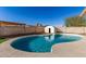 Relaxing kidney shaped pool in backyard oasis at 1052 S Kachina --, Mesa, AZ 85204