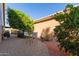 Small courtyard with lemon trees and seating for two at 10929 E Spring Creek Rd, Sun Lakes, AZ 85248