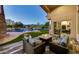 Relaxing patio seating area with fire pit and view of the pool at 12832 E Sorrel Ln, Scottsdale, AZ 85259