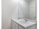 Bathroom with double vanity and marble countertop at 17705 W Mission Ln, Waddell, AZ 85355