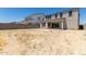 Large backyard with desert landscaping, providing ample space at 19743 W Exeter Blvd, Buckeye, AZ 85340