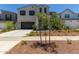 Two-story house with gray siding, brown garage door, and landscaping at 19743 W Exeter Blvd, Buckeye, AZ 85340