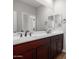Laundry room with vinyl flooring, drain and hook ups for washer and dryer at 19743 W Exeter Blvd, Buckeye, AZ 85340