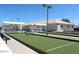 Community bocce ball courts with covered seating area at 2064 S Farnsworth Dr # 46, Mesa, AZ 85209