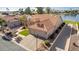 Single-story home with a two-car garage and artificial turf at 26606 S Foxglenn Dr, Sun Lakes, AZ 85248