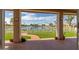 Patio with lake view and walking path at 26606 S Foxglenn Dr, Sun Lakes, AZ 85248