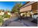 Relaxing backyard oasis with covered patio, lounge chairs, and swimming pool at 4442 E Walatowa St, Phoenix, AZ 85044