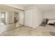 Bedroom with mirrored closet doors and backyard view at 4442 E Walatowa St, Phoenix, AZ 85044