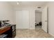 Bright bedroom with built-in closet and tile floor at 4442 E Walatowa St, Phoenix, AZ 85044