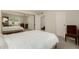 Bedroom with mirrored closet doors and chair at 4442 E Walatowa St, Phoenix, AZ 85044