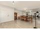 Light and airy entryway with double doors, wood floors, and view into dining area at 4442 E Walatowa St, Phoenix, AZ 85044