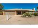 Brick ranch house with a two-car garage and desert landscaping at 4442 E Walatowa St, Phoenix, AZ 85044