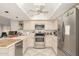 Spacious kitchen with stainless steel appliances and light wood cabinets at 4442 E Walatowa St, Phoenix, AZ 85044