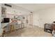 Open concept kitchen with island seating and stainless steel appliances at 4442 E Walatowa St, Phoenix, AZ 85044