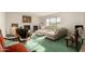 Bright living room featuring a comfortable sectional sofa and a fireplace at 4442 E Walatowa St, Phoenix, AZ 85044