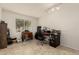 Home office with desk and window overlooking backyard at 4442 E Walatowa St, Phoenix, AZ 85044