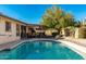 Inviting kidney-shaped pool with ample surrounding patio space at 4442 E Walatowa St, Phoenix, AZ 85044