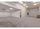 Spacious three-car garage with ample storage space at 5825 N 107Th Ln, Phoenix, AZ 85037